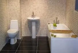 A completed bathroom with a wall-hung basin and mixer tap.